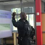 Renton Police Sgt. Corey Jacobs spoke at the forum on Feb. 10.