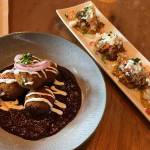 Croquetas Con Mole and the Pork Tostones from Mexicuban in Renton. (Cameron Sheppard/Sound Publishing)