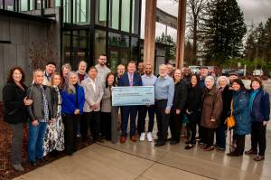 Photo courtesy of Bruce Hudson
Former Seattle Seahawks player Doug Baldwin received a check last month for $42,805 from the Renton Rotary Club. Thanks to the clubs donation, all senior programming during senior times is free during the winter session at the Family First Community Center.