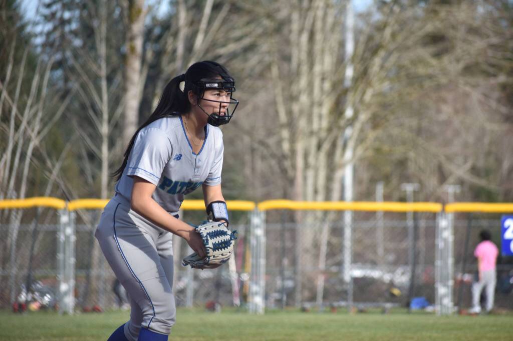 Patriot sophomore Avery Huh eyes down the catcher against the Conks of Kentwood. Ben Ray / The Reporter