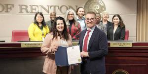 The Renton City Council, Mayor Armondo Pavone, and Kate Krug from the King County Sexual Assault Resource Center pose with the Sexual Assault Awareness Month proclamation. Photo courtesy of the City of Renton