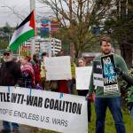 Various members of the Washington Against Nuclear Weapons Coalition and other people protest the Israel-Hamas war on Grady Way. Photo by Joshua Solorzano/Renton Reporter