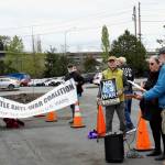 Various members of the Washington Against Nuclear Weapons Coalition gathered near the Evergreen Building on Grady Way, singing songs during their protest against military spending. Photo by Joshua Solorzano/Renton Reporter