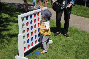 A child playing Connect Four at Earlington Park. Photo by Bailey Jo Josie/Sound Publishing