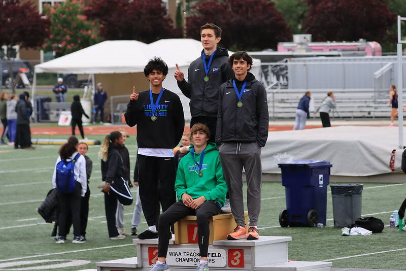 Libertys 4X100M relay team atop the podium. Photo Provided by Matthew Stuart