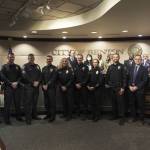 Honored officers, promoted officers, the officer of year and others posing for a photo at the Renton City Council meeting. Courtesy photo