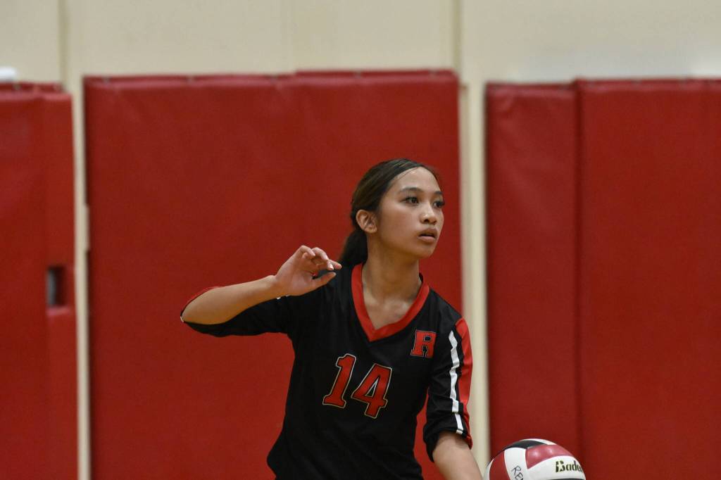 Rentons Khloe Mallory prepares to serve against Hazen. Ben Ray / The Reporter