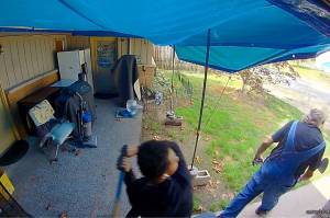 Ring camera footage captured KShawn Konscience Jimerson striking Michael Dean Gray with a wooden stick prior to the stabbing, according to an affidavit of probable cause. (Court documents)