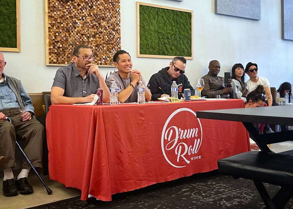 Representatives from sponsors Rain City Market, Macadons and Diablo Guitars made up the judging table for the Battle of the Acoustic Bands. Courtesy photo