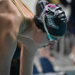 Sophie Buchan preps for her 200-freestyle race at state. Ben Ray / The Reporter