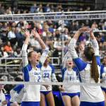 Hayden Quinto and Maiya Lester celebrate a point against West Seattle. Ben Ray / The Reporter