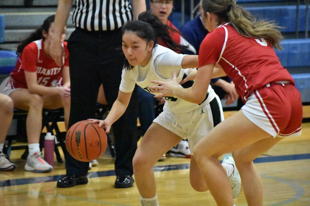 Addison Tran drives to the basket. Ben Ray / The Reporter