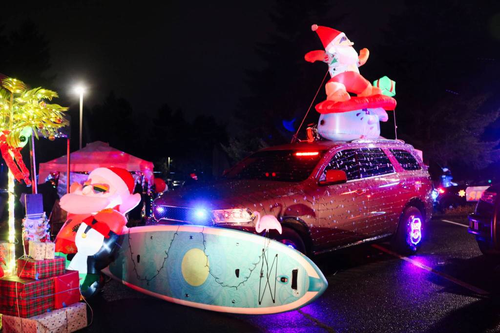 The Department of Homeland Security Investigations (HSI) went for a beach theme, complete with a surfing Santa Claus. Photos by Bailey Jo Josie/Sound Publishing.