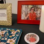 A photo of Kim Unti and a book to share memories of her at a celebrating her life. Photo by Joshua Solorzano/Renton Reporter