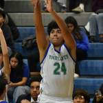 Sophomore Tyson Burley shoots a three point shot. Ben Ray / The Reporter