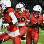Rivalry games undoubtedly create the best atmospheres when it comes to football, and Renton and Lindbergh supporters who arrived at Renton Memorial Stadium had hopes that their side would come out on top Sept. 20 in the Battle of the Birds. But it was Rentons night as they dismantled the Lindbergh Eagles. Pictured: Renton junior Major Bloodsaw runs the ball with blockers in front. Ben Ray / The Reporter