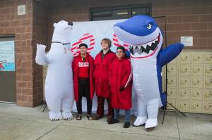 Photo op at the 2024 Polar Bear Plunge. Photo by Bailey Jo Josie/Sound Publishing.