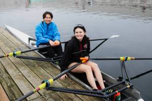 Kai Powers and Izzy Teal get a good row in on a cold December afternoon. Rowing works up a sweat so its best to dress in layers. Photo by Bailey Jo Josie/Sound Publishing.
