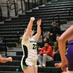 Ella Whitaker takes a three-point shot against North Thurston. Ben Ray / The Reporter