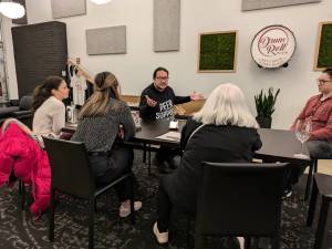 Joaquin Delgado was the guest speaker at the monthly Renton Reporter Read All About It chat night, where he spoke about his work with Peer Kent and how he helps people going through the local court system. The next Read All About It night will be Tuesday, Feb. 25, at Drum Roll Wine in downtown Renton. Photo by Bailey Jo Josie/Sound Publishing.