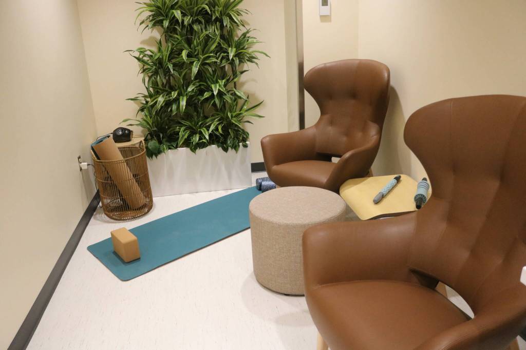 The Wave Room is a space within the Cancer Center thats dedicated to caregivers who may need to take some time to care for themselves. The space includes chairs, tables, charging stations, a bathroom and yoga equipment. Photo by Bailey Jo Josie/Sound Publishing.