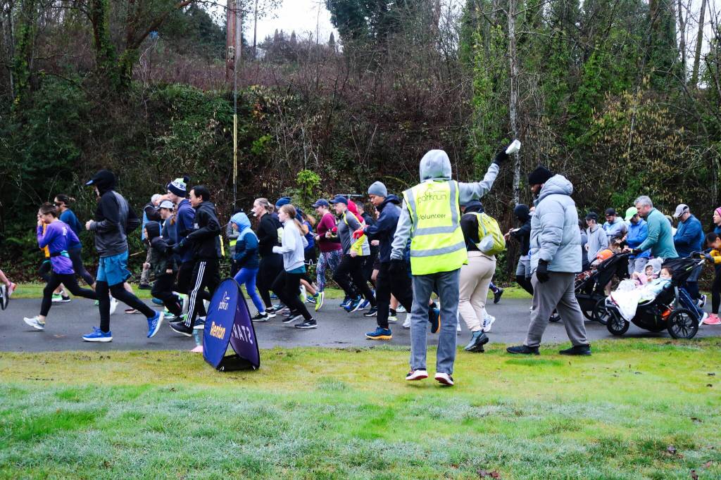 Right at 9 a.m. every Saturday, runners and walkers are off at ParkRun. Photo by Bailey Jo Josie/Sound Publishing.