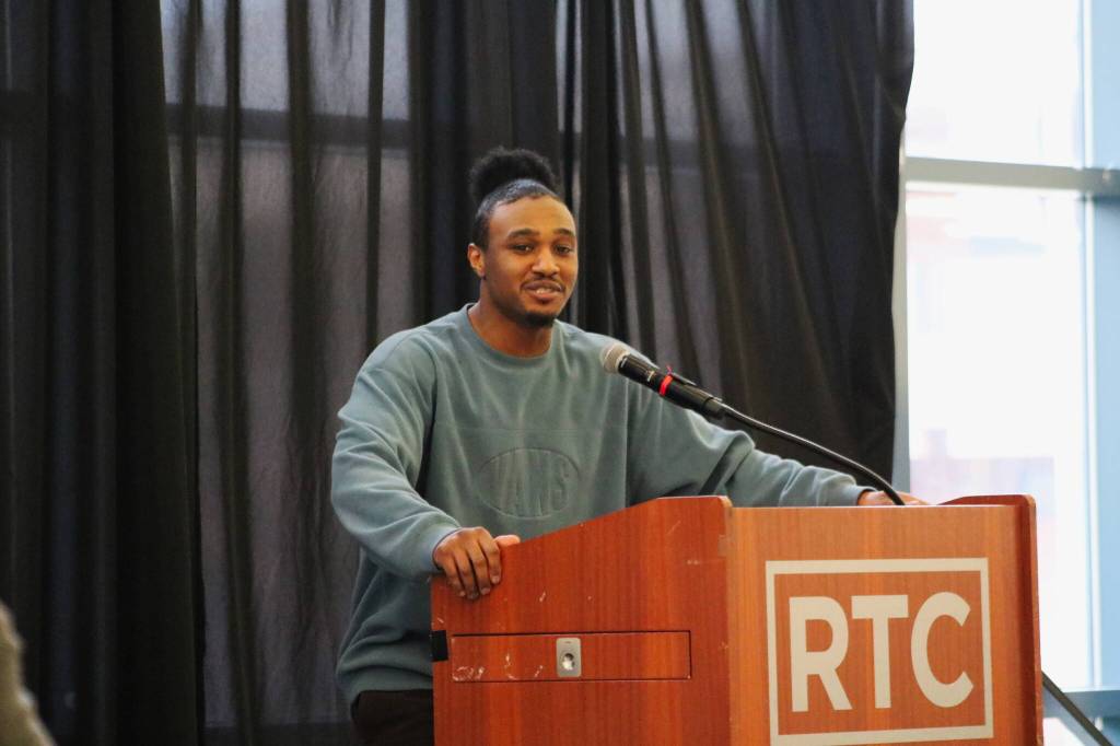 Alejandro Snead performs spoken word at the 2025 Black History Month Forum at RTC. Photo by Bailey Jo Josie/Sound Publishing.