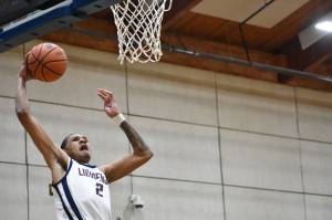James Huff IV goes for a dunk during his MVP season. Ben Ray / The Reporter