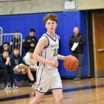 Libertys Jackson Whitaker assesses the defense against Bishop Blanchet. Ben Ray / The Reporter
