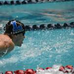 Cole Canaday of Liberty HS swims at the state swim meet at the King County Aquatic Center. Ben Ray / The Reporter