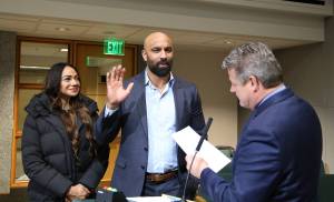 Councilmember Reagan Dunn swears in former NFL player and Renton native Mkristo E. Bruce to the King County Fire Protection District No. 47 Board of Commissioners. Bruce was unanimously appointed to the position on Tuesday, February 25, 2025. Photo provided by David Shurtleff.
