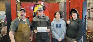 The Renton Promise initiative allowed Mason Nelson (center left) and Vanessa Garcia (center right) to enroll in RTCs Welding Program in 2024. Nelson and Garcia are pictured with welding instructors Rick Geist (left) and Elisa Westcrook (right). Photo courtesy of Renton Technical College