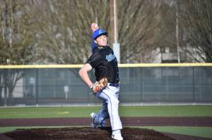 Ryan Boehm delivers a pitch against the Kentridge Chargers. Ben Ray / The Reporter