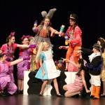 Various residents of Wonderland tricking Alice during the Mad Hatters Tea Party from Alice in Wonderland Jr. Fall 2024. Courtesy of Kettleworks Performing Arts