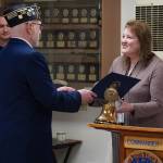 American Legion Post 19 member presenting a certificate to the Valley Communications representative. Photo by Joshua Solorzano/The Reporter.
