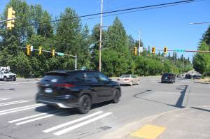 Cars drive northbound through the intersection of Southeast 192nd Street and 140th Avenue Southeast in Fairwood. An 18-year-old was driving over 100 mph southbound through this intersection on March 19 when his car hit a minivan, resulting in the deaths of one woman and three minors. Photo by Bailey Jo Josie/Sound Publishing.