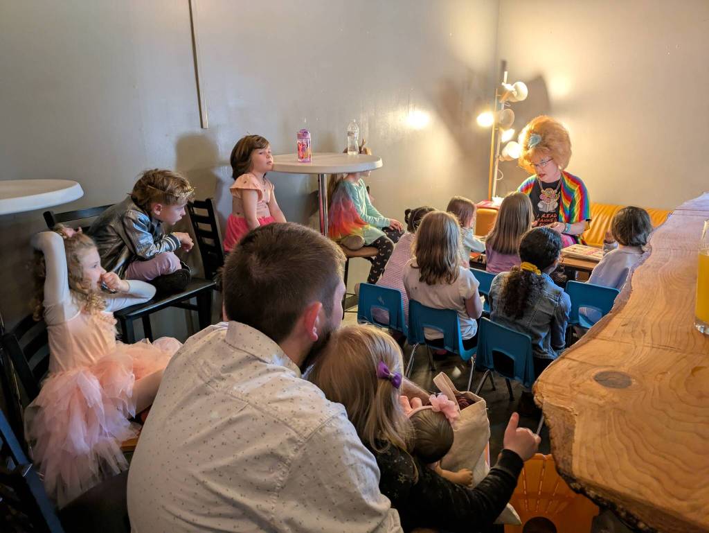 Sylvia OStayformore reads a story to families. Photo by Bailey Jo Josie/Sound Publishing.