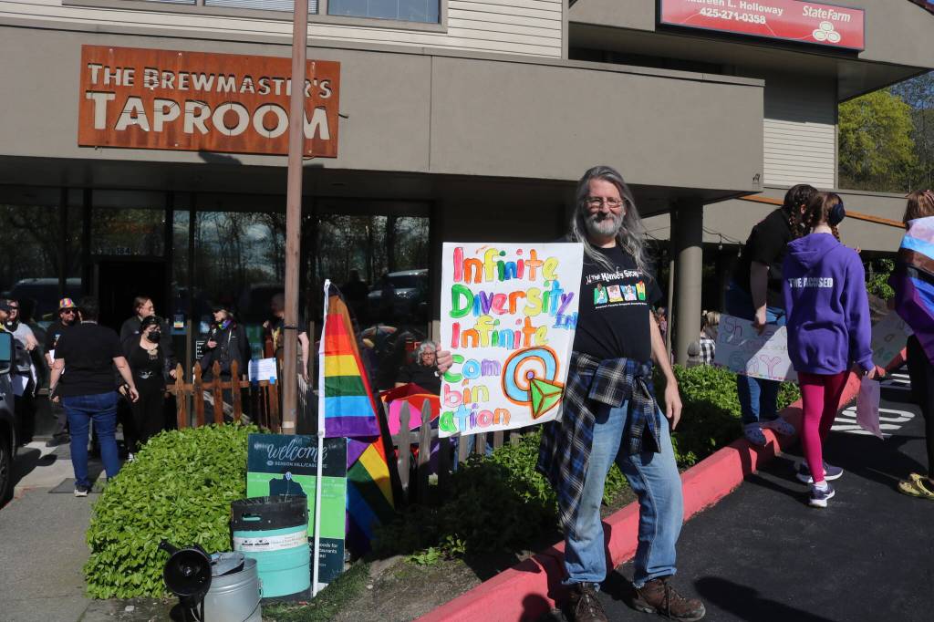 One sign said, Infinite Diversity in Infinite Combination. Photo by Bailey Jo Josie/Sound Publishing.