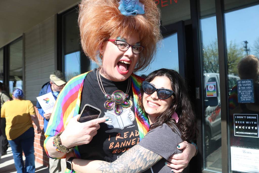 Sylvia OStayformore hugs Renton City Councilmember Carmen Rivera. Photo by Bailey Jo Josie/Sound Publishing.