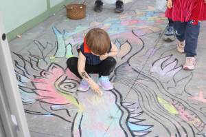 Dragon chalk drawings were one of the many activities at this years Dragon Landing celebration. Photo by Bailey Jo Josie/Sound Publishing