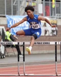 Kenyon Andrews leaps over hurdles at Mount Tahoma. Photo provided by Buddy Ryan.