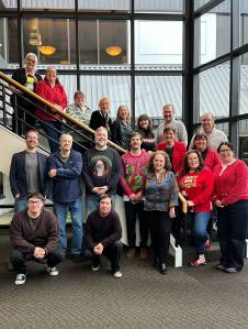 A group photo from Dec. 2024 of Sound Publishings King County news team that produces local newspapers including the Renton Reporter. File photo