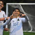 Niko Uzelac and Nathen Song celebrate the first goal for Hazen. Ben Ray / The Reporter