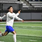 Benji Toscano celebrates his goal against Kent-Meridian. Ben Ray / The Reporter