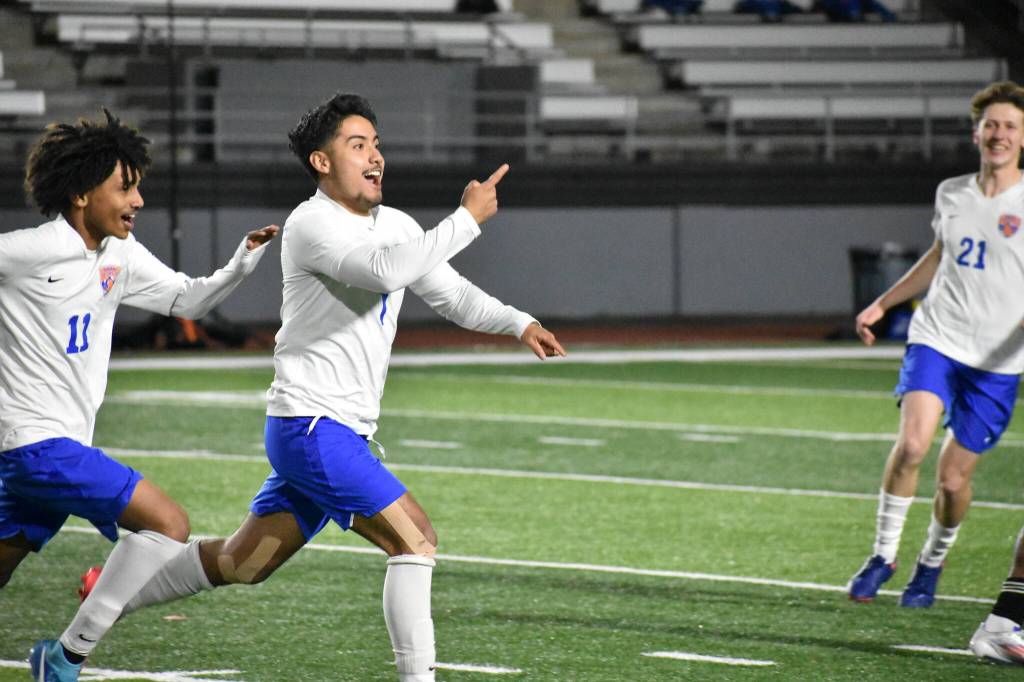 Benji Toscano celebrates his goal against Kent-Meridian. Ben Ray / The Reporter