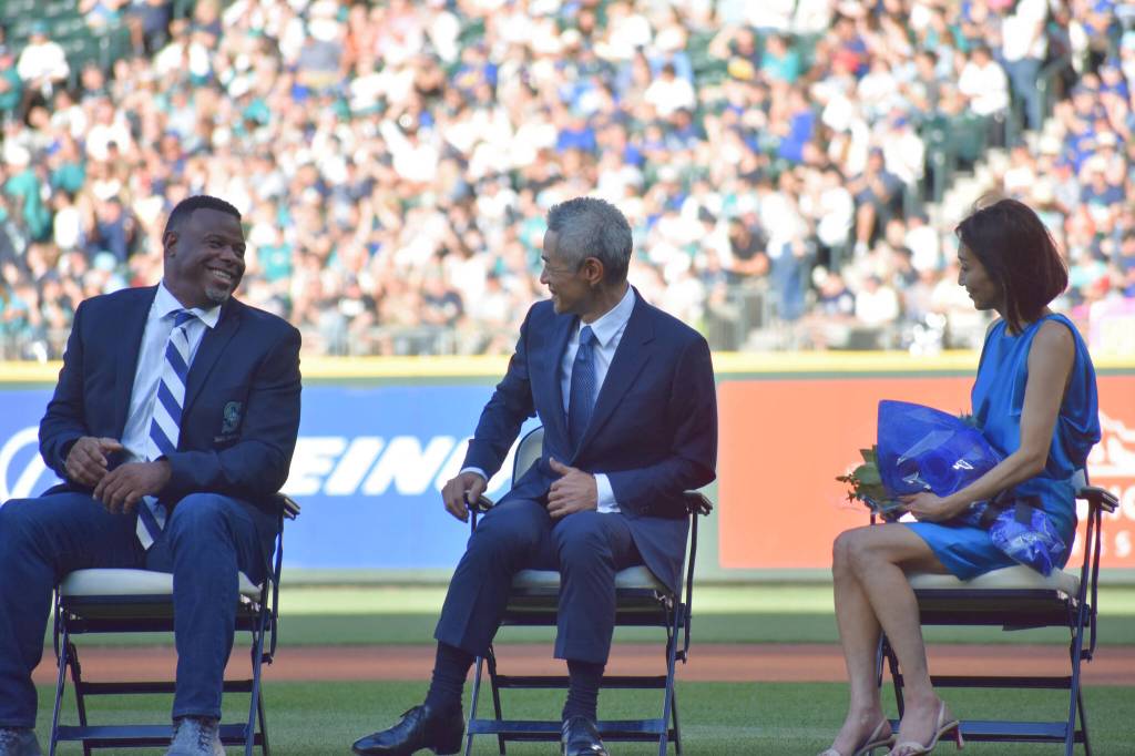 Ichiro and Ken Griffey Jr. share a laugh during Ichiros number retirement ceremony. Ben Ray / Sound Publishing