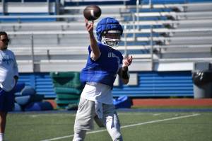 Dawson Durham makes a pass during Liberty football practice. Ben Ray / The Reporter