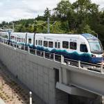 A light rail vehicle parked Aug. 18 on the alignment during the construction of the Star Lake Station in Kent. COURTESY PHOTO, Sound Transit