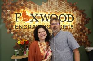 Owner Joanna Lis and her husband Krystof of Foxwood Engraving. Photo by Bailey Jo Josie/Sound Publishing.