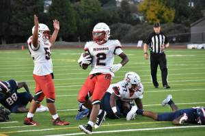 Patrick Turner rushes into the endzone against Lindbergh. Ben Ray / The Reporter